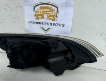 2014  UB Left Headlight
