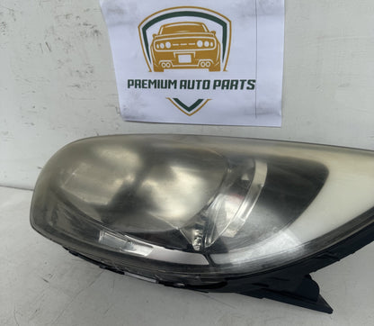2014  UB Left Headlight