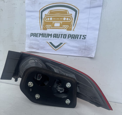 2009  CU Left Taillight