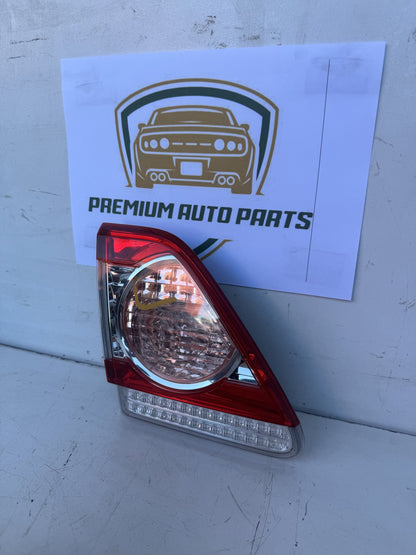 2010  E150 Left Bootlid Light