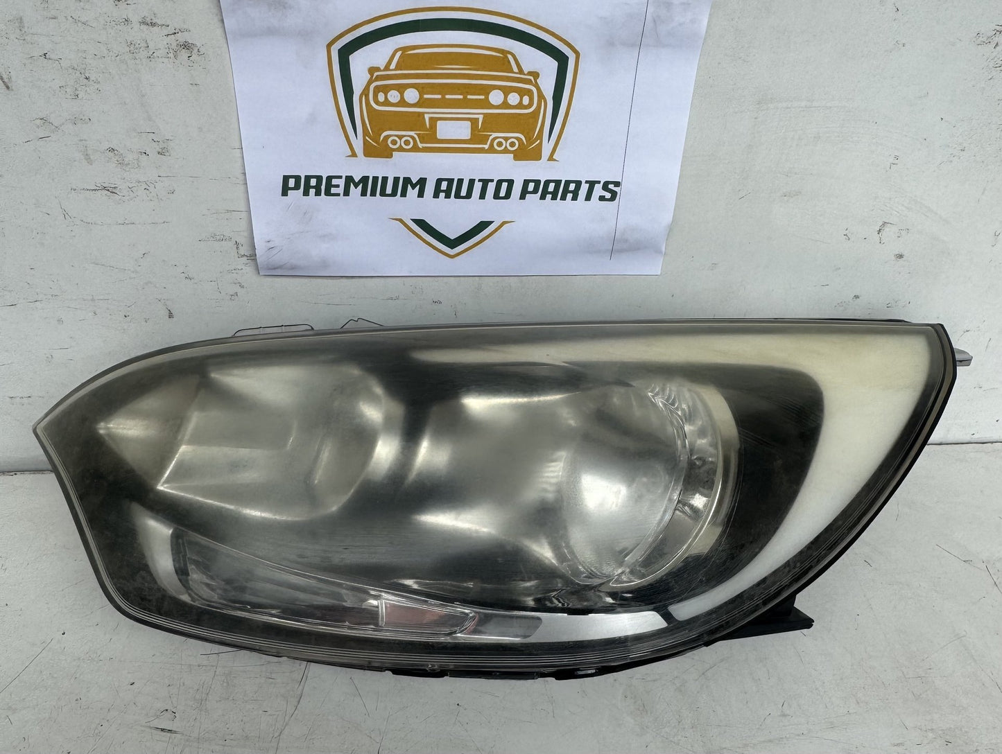 2014  UB Left Headlight
