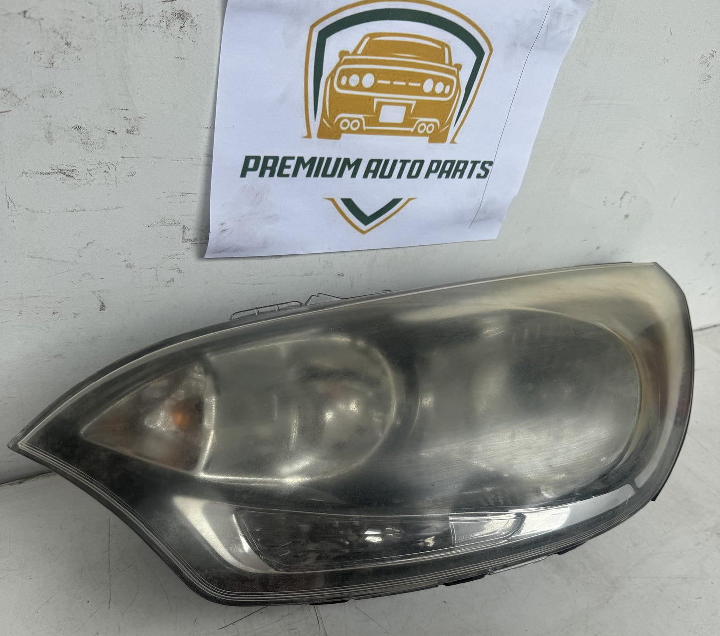 2014  UB Left Headlight