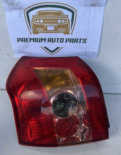 2004  E120 Left Taillight