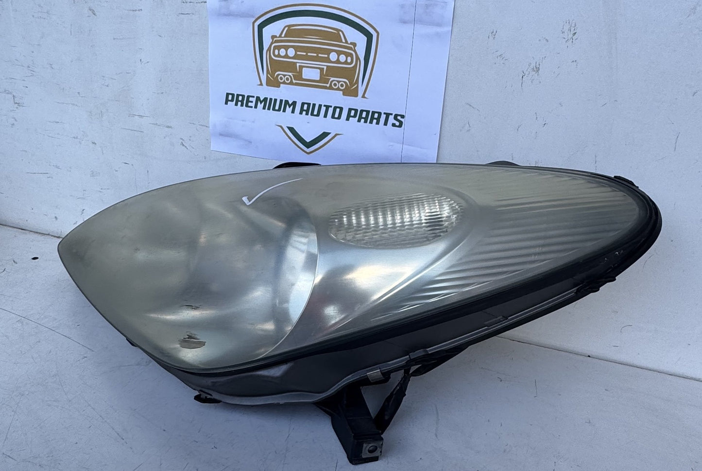 2003   Left Headlight