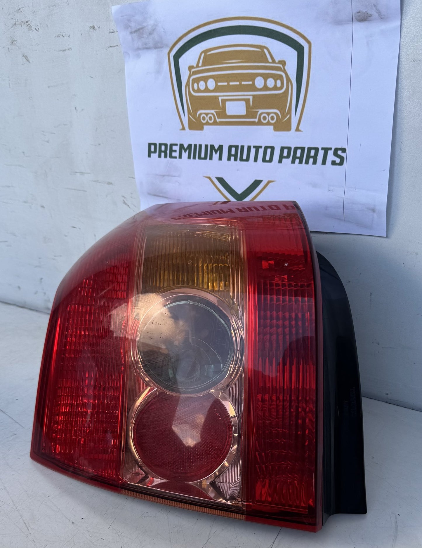 2004  E120 Left Taillight