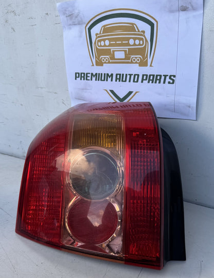 2004  E120 Left Taillight